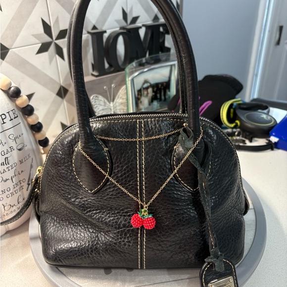 Dooney & Bourke Handbags - Dooney & Bourke Vintage Black Satchel w/ charm bracelet EUC